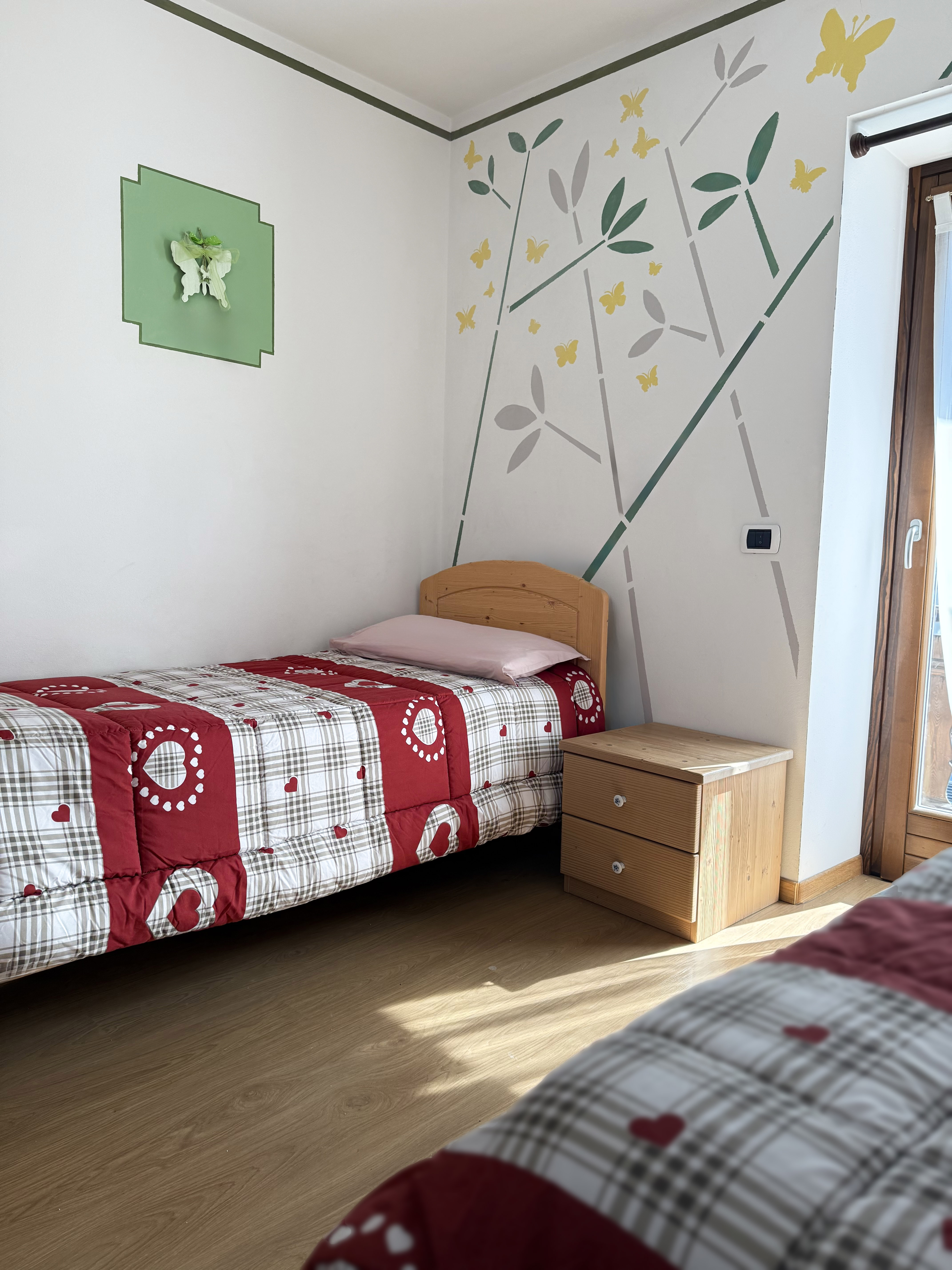 Camera da letto con due letti singoli