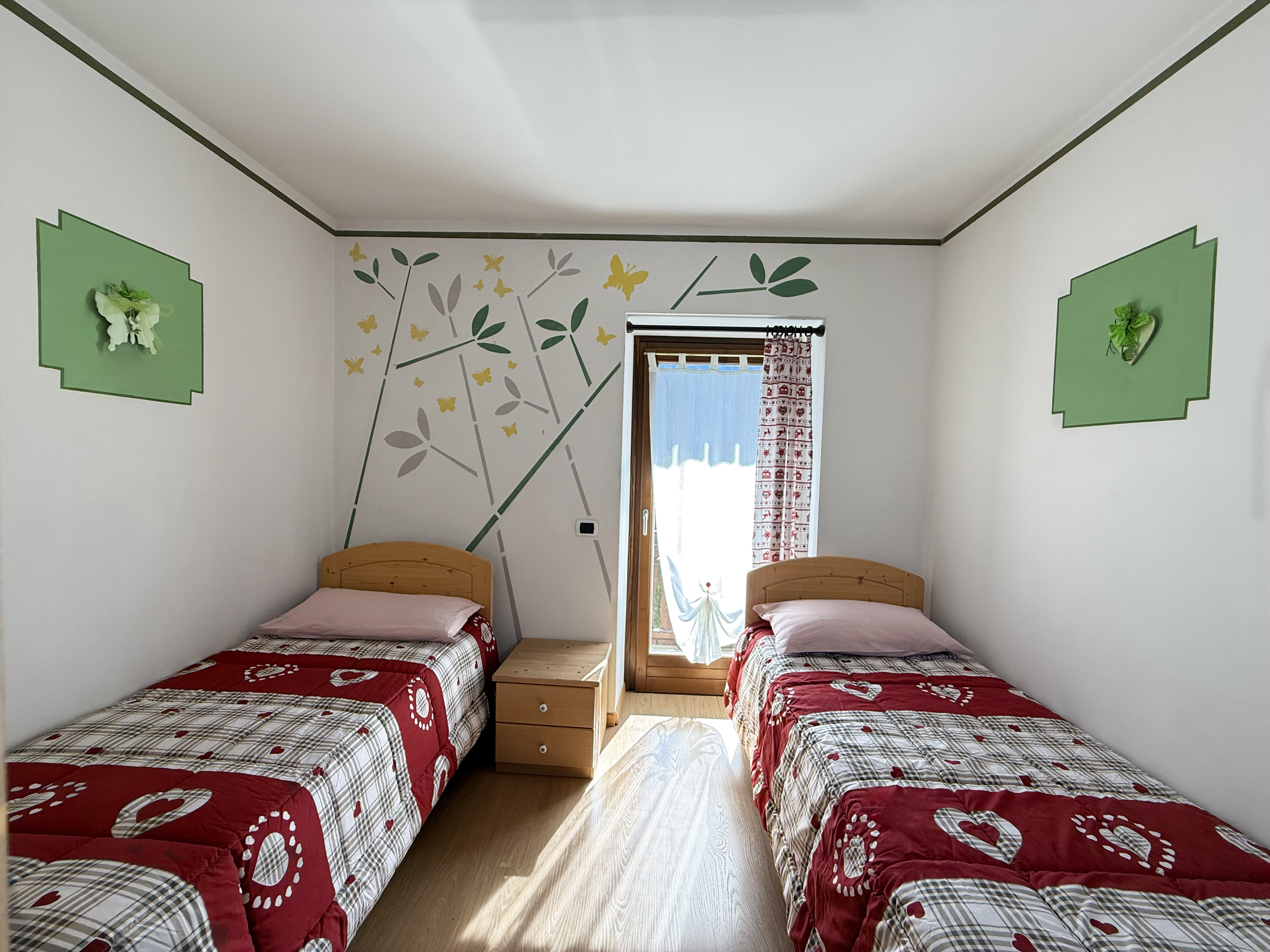 Camera da letto con due letti singoli